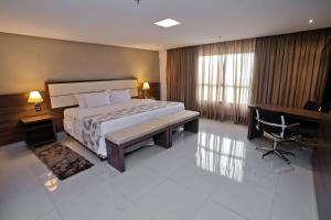 Säng eller sängar i ett rum på SJ Premium Hotels By Atlantica