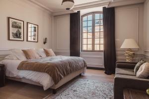 Château Laffitte Carcasset客房内的一张或多张床位