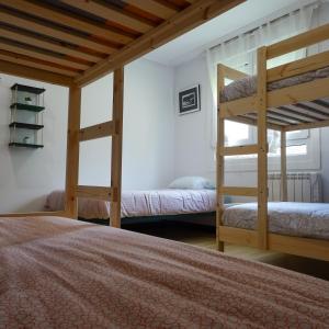 El Gato Gordo - Riders Hostel emeletes ágyai egy szobában