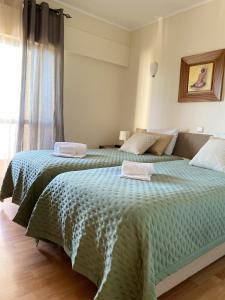 Postel nebo postele na pokoji v ubytování Charming Vilamoura Apartment with Shared Pool