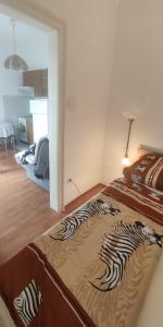 Posteľ alebo postele v izbe v ubytovaní Jana apartman