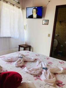 TV a/nebo společenská místnost v ubytování Pousada Casa Do Mar