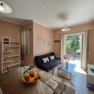 A seating area at Μπουκαμβίλια - Bougainvillea