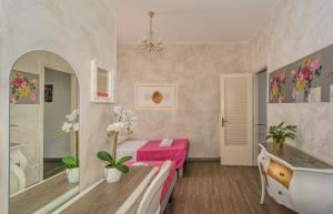 Postel nebo postele na pokoji v ubytování B&B Relais Inn Lucca