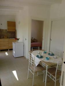 Η κουζίνα ή μικρή κουζίνα στο Il Poggetto Marzamemi - Le Villette +18 φωτογραφίες