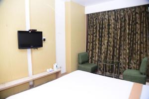 Televisyen dan/atau pusat hiburan di Hotel Maharani