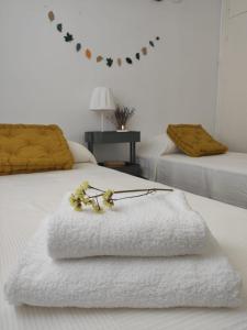 A bed or beds in a room at Villa Coral