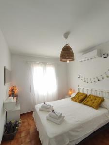 A bed or beds in a room at Villa Coral