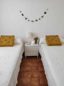 A bed or beds in a room at Villa Coral