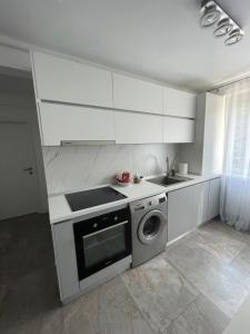 Luxury Apartmentにあるキッチンまたは簡易キッチン +22枚の写真