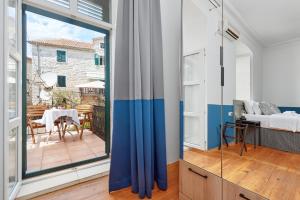 Postel nebo postele na pokoji v ubytování Kotor Nest