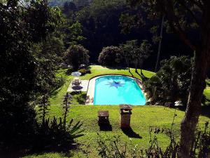 A view of the pool at Sitio do Rumo or nearby