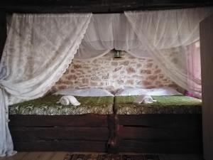 Postel nebo postele na pokoji v ubytování Ελαιώνας - Solar Energy House