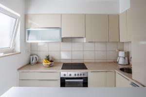 Kuchyňa alebo kuchynka v ubytovaní Apartment ANA Podstrana