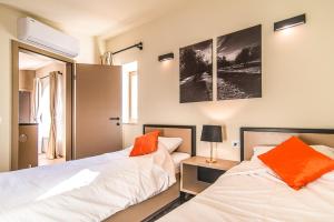 Postel nebo postele na pokoji v ubytování Villa Ulika by Villa Plus + 11 fotografií