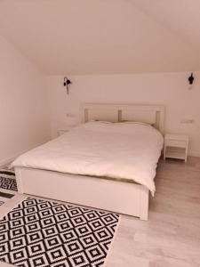Ένα ή περισσότερα κρεβάτια σε δωμάτιο στο Casa Carolina