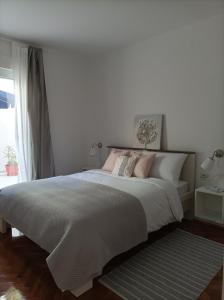 Posteľ alebo postele v izbe v ubytovaní LUXURY APARTMENT MEJE + 35 fotografií
