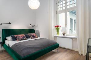 Posteľ alebo postele v izbe v ubytovaní Prince4You Apartments