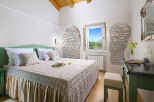 Postel nebo postele na pokoji v ubytování Villa Faggiolo by Villa Plus