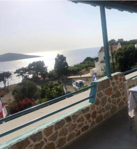 a view of the ocean from the balcony of a house at Mary Popi in Panormos Kalymnos