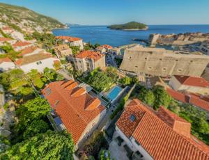 an overhead view of a city with buildings and the ocean at Villa Revelin Dubrovnik Old Town in Dubrovnik