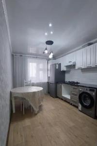 Köök või kööginurk majutusasutuses 1-комнатная квартира
