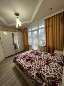 Postel nebo postele na pokoji v ubytování Sea Apartments