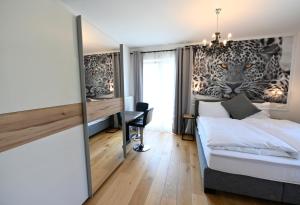 Katil atau katil-katil dalam bilik di Enjoyit Velden West