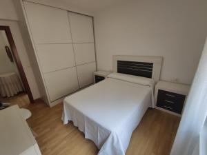 Posteľ alebo postele v izbe v ubytovaní Casa Chouza