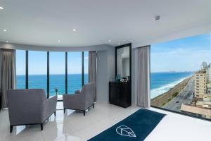 a hotel room with a view of the ocean at MaRadha Colombo in Colombo