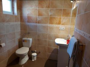 Kúpeľňa v ubytovaní Corner Apartman 5 + 37 fotografií
