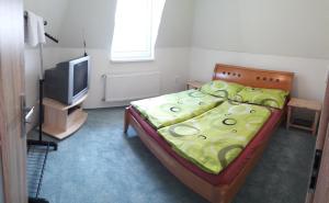 Postel nebo postele na pokoji v ubytování Villa Jakubov