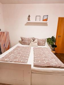 Ein Bett oder Betten in einem Zimmer der Unterkunft Fw Friedrichshafen bodensee