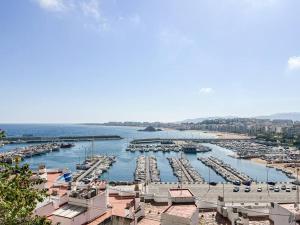 a view of a marina with boats in the water at Apartament 'Es Botànic' in Blanes