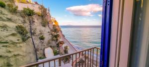 a view of the ocean from a balcony at Hotel Regina del Mare in Ischia