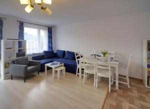 Posedenie v ubytovaní Trevilles Apartamenty - Granatowy