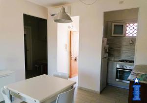 Η κουζίνα ή μικρή κουζίνα στο CASA MANIN - Favignana +6 φωτογραφίες