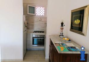 Η κουζίνα ή μικρή κουζίνα στο CASA MANIN - Favignana