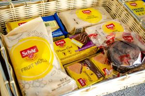 a shopping basket filled with different types of food at Hotel Regina del Mare in Ischia