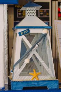 a cake of a boat with a net and a starfish at Hotel Regina del Mare in Ischia