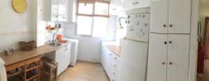 Kuchyň nebo kuchyňský kout v ubytování APARTAMENTO 70MT 1 LINEA DEL MAR MENOR LO PAGAN + 4 fotografie