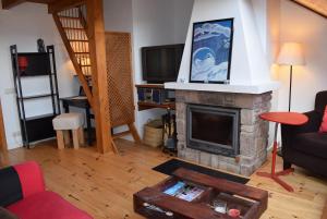 A television and/or entertainment centre at Apartamento Neril