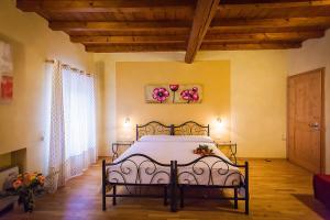 Postel nebo postele na pokoji v ubytování Hotel Alla Corte dei Bicchi