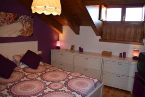 A bed or beds in a room at Apartamento Neril