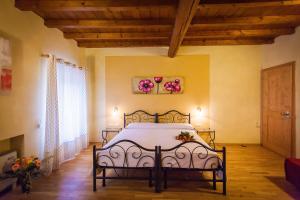 Postel nebo postele na pokoji v ubytování Hotel Alla Corte dei Bicchi