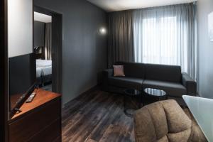 Гостиная зона в Hotel am Augustinerplatz