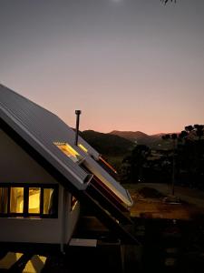 a roof of a house with solar panels on it at ALTITUDE MÁXIMA - Cabanas de Altitude in Urubici