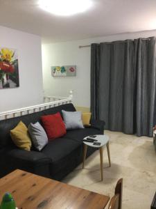A seating area at Lovely 2 Bedroom Holiday Apartment in Central Caleta de Fuste