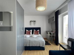 Posteľ alebo postele v izbe v ubytovaní S&M Villa Kolobrzeg