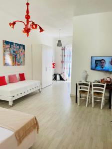 TV a/nebo společenská místnost v ubytování Casa Junno